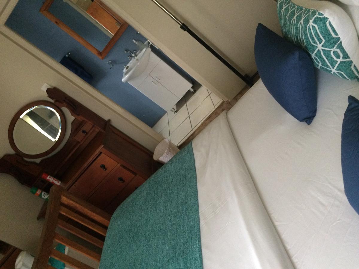 Breeze Inn Guesthouse Kiddʼs Beach Kamer foto